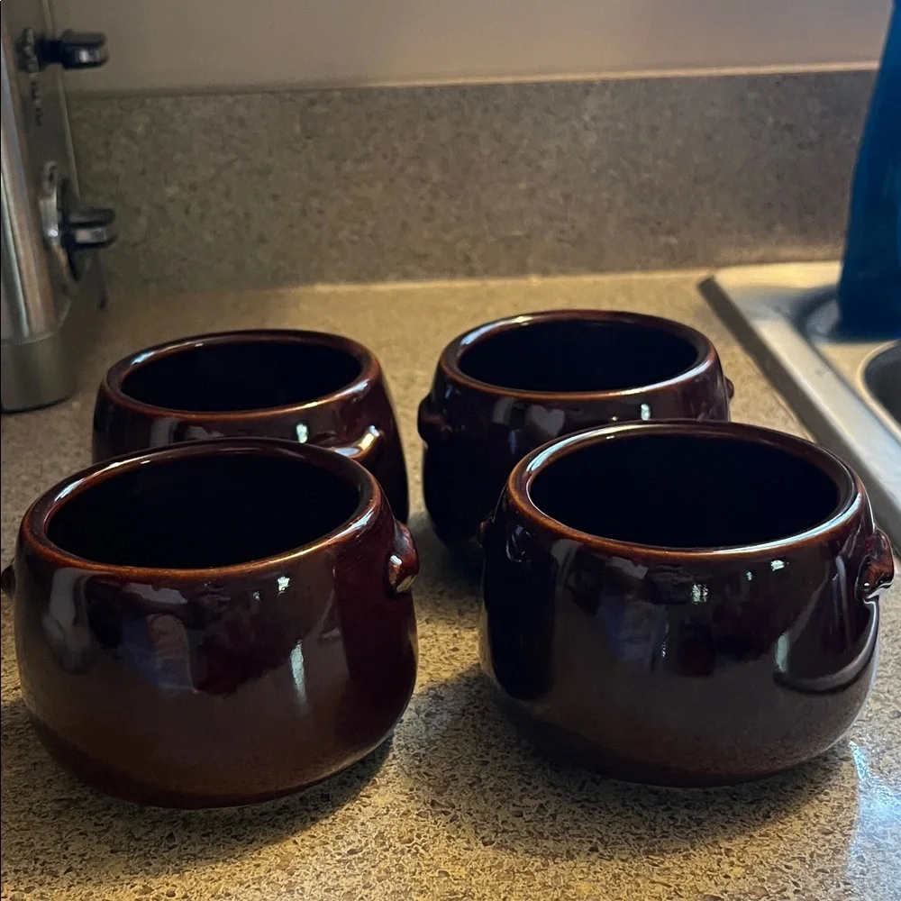 Vintage set of four West Bend bean pots. No. 5.109 with original box.